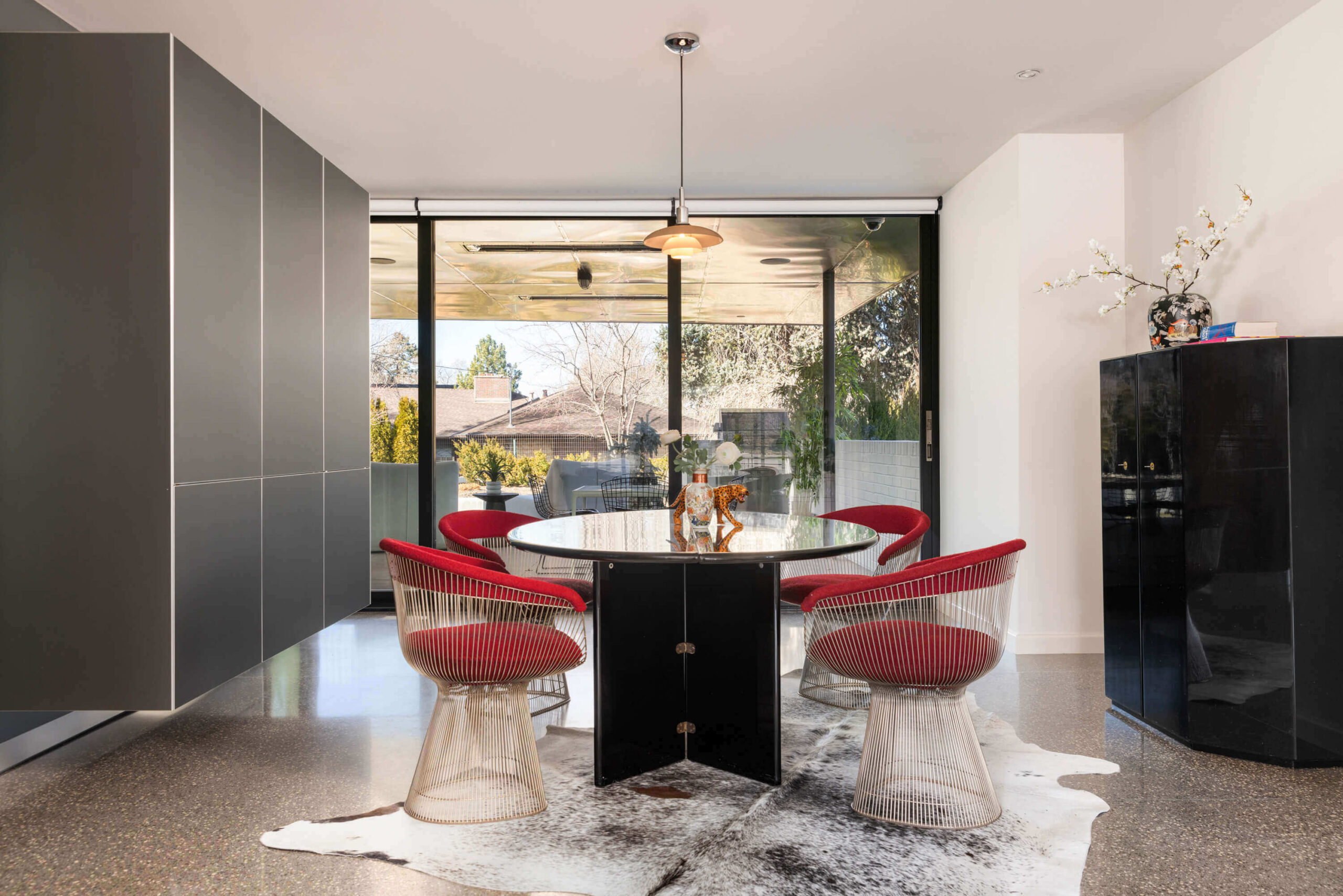 modern dining room floor to ceiling windows